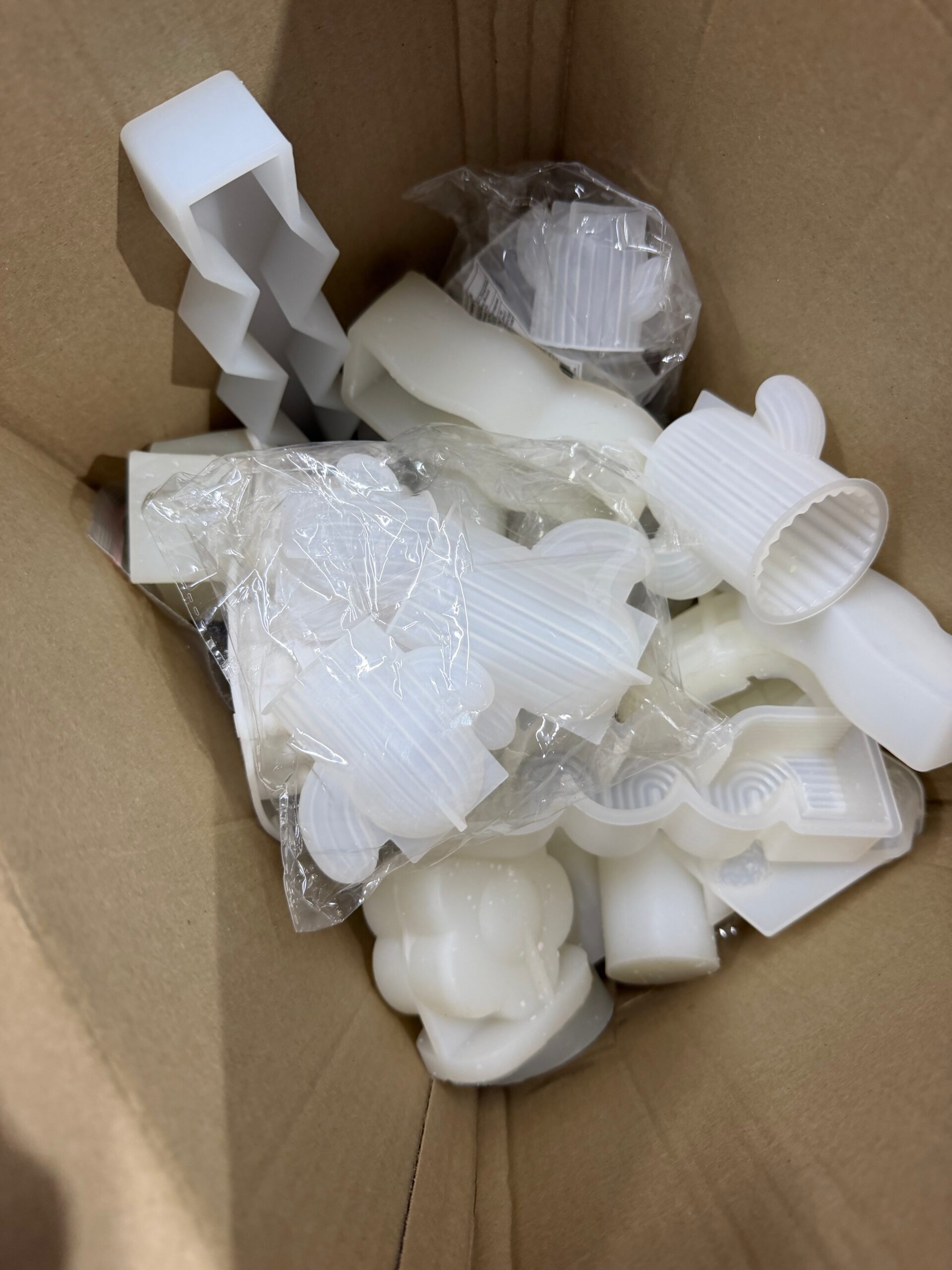 Box with candle moulds